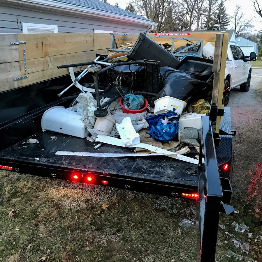 Roll-off dumpster delivered to a residential driveway in Taylorville