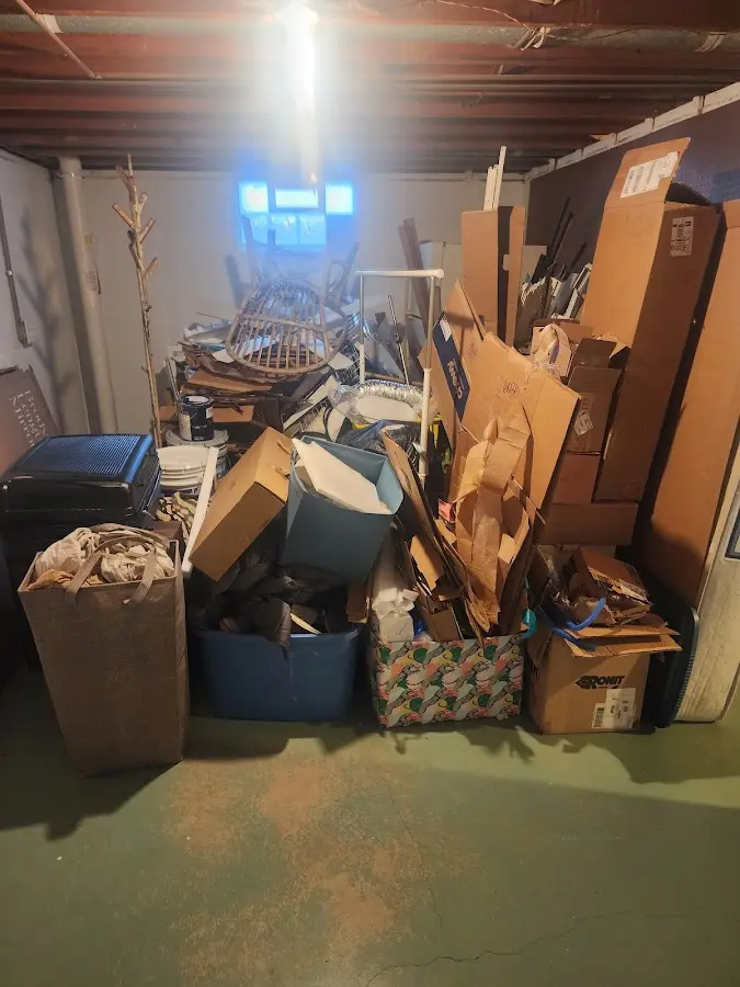 Roll-off dumpster container at job site for 2 Yard Dumpster Rental in Taylorville